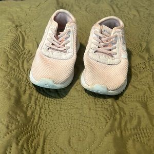 Kids pink and white adidas tennis shoes in size 9.
